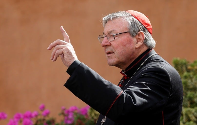 Cardinal George Pell, prefect of the Vatican Secretariat for the Economy, leaves the morning session of Synod 2014. Photo: CNS/Paul Haring 