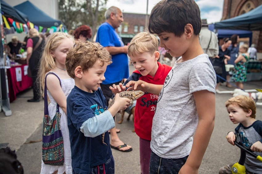 Children with water dragon at the Blessing of the Animals