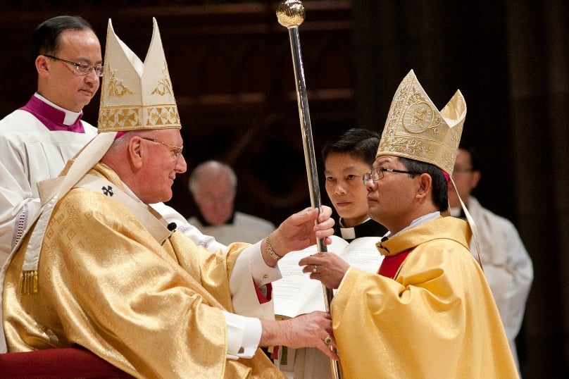 Bishop Vincent Long OFMConv (right) on the day of his installation as a bishop of Melbourne. PHOTO: Fiona Basile