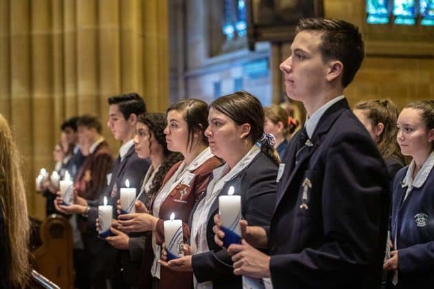 Students pray in cathedral