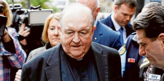 Archbishop Philip Wilson of Adelaide leaves the Newcastle Court on 3 July.