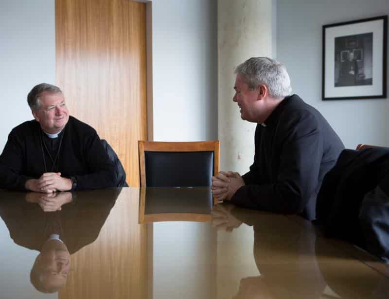 Archbishop Anthony Fisher and Auxiliary Bishop Richard Umbers, both of Sydney, are seen during an interview Jan. 16 at the St. John Paul II National Shrine in Washington. Photo: CNS photo/Tyler Orsburn