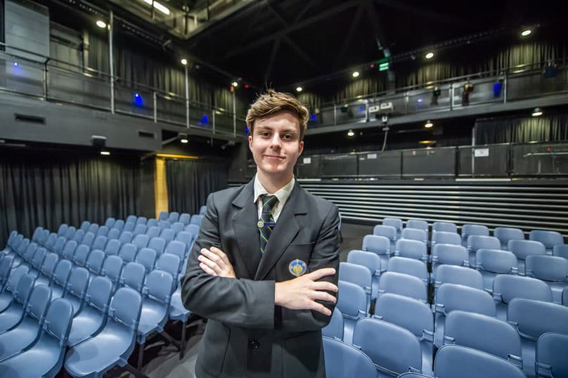Year 12 student Gaius Commons in the purpose-built theatre.