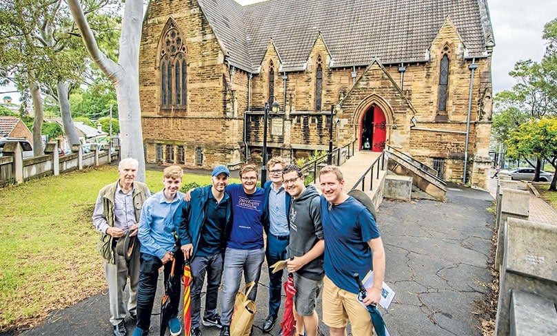 Ronan Reilly, second from right, and fellow walkers set out from St Thomas of Canterbury Church. Photo: Giovanni Portelli