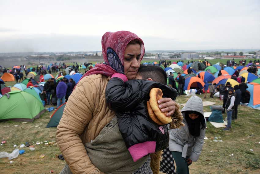 Migrant woman and child