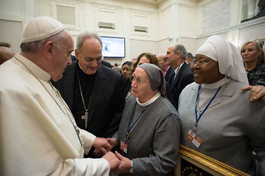 Pope Francis greets Sr Bonetti