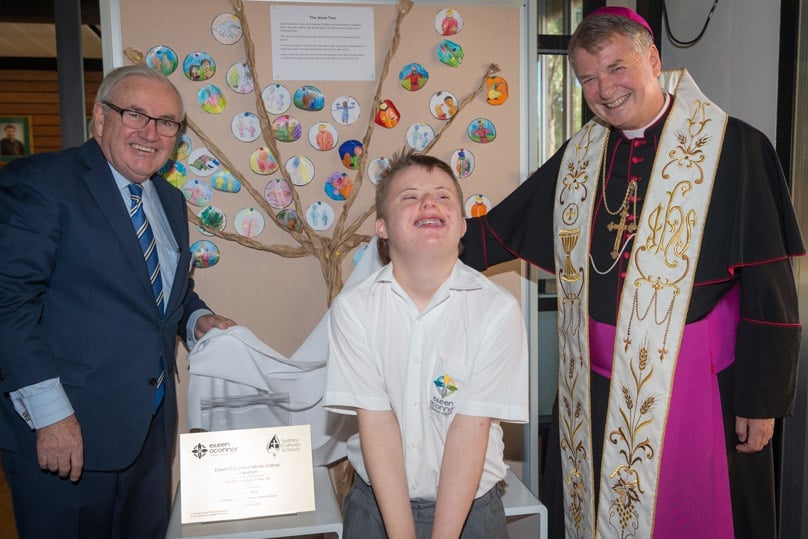 Dr Dan White at the 2016 official opening and blessing of the Eileen O'Connor Catholic College in Lewisham with Archbishop Anthony Fisher OP and student Jackson Mason. Photo: Therese Spruhan