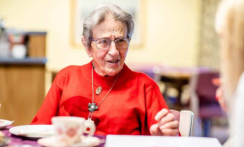 Sister Eymard McNamara enjoys a cup of tea at Ryde’s Calvary Retirement Community. Photo: Alphonsus Fok