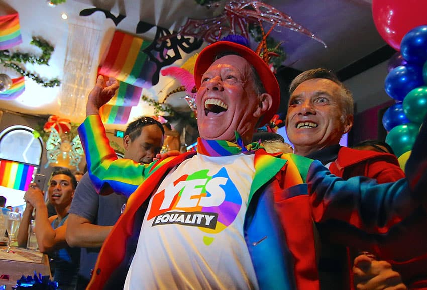 Members of Sydney's gay community celebrate in 2017. After a majority of Australians indicated they favoured same-sex marriage, Australia's bishops said legislators must ensure that any new law on marriage include protection for religious freedom. Photo: Steven Saphore, Reuters   