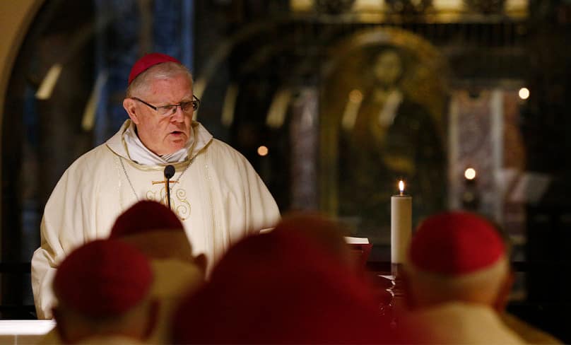 Archbishop Mark Coleridge of Brisbane gives the homily as Australian bishops concelebrate Mass in the crypt of St. Peter's Basilica. Photo: CNS photo/Paul Haring