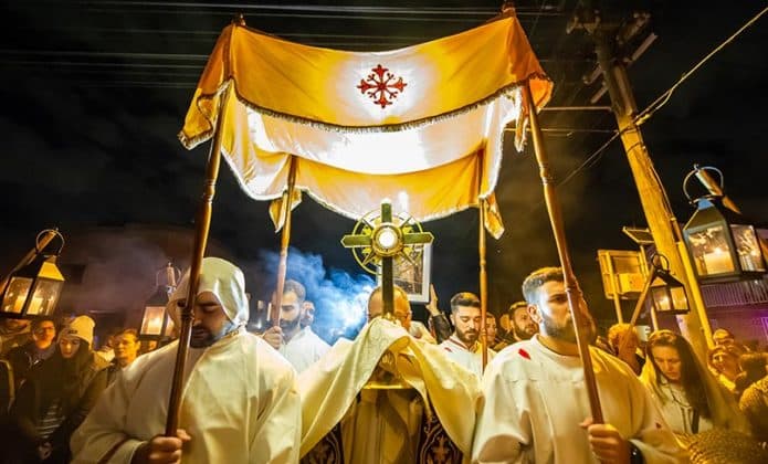 Almost 1000 Catholics from three rites – Maronite, Melkite and Roman—took their faith to the streets of western Sydney for the feast of Corpus Christi. Photo: Giovanni Portelli