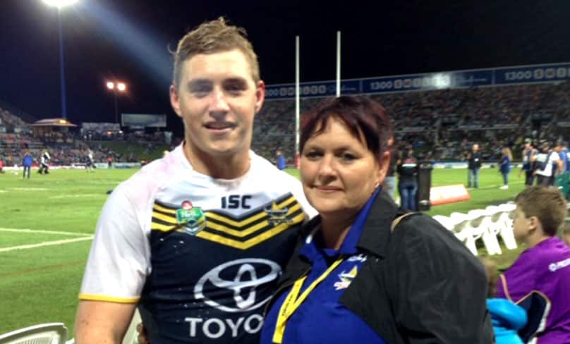 Proud mum Angela with her late son Regan during a game with North Queensland Cowboys.
