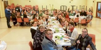Emmanuel members gather for dinner on the Community’s retreat.
