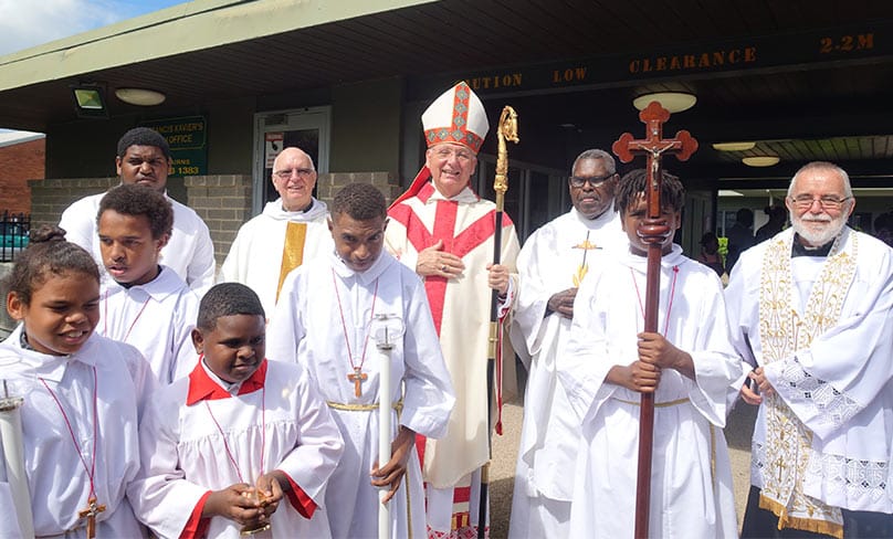 Fr Kopel Gibuma with Lismore Emeritus Bishop Geoffrey Jarrett In St Francis Xavier Church. Photo: ACBC
