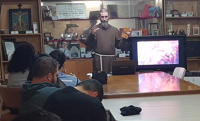 Fr Thomas McFadden OFM CAP, vocations director for the Capuchin Friars, gives a catechesis on the Glory of God to youth at St Felix de Valois parish. Photo: Alison De Sousa