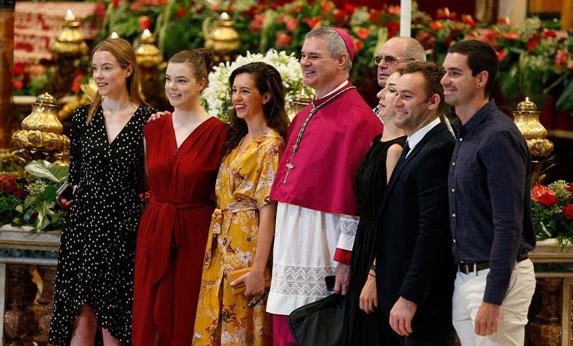 Archbishop Peter A. Comensoli of Melbourne, Australia, poses for a photo with family members before Pope Francis' celebration of Mass marking the feast of Sts. Peter and Paul in St. Peter's Basilica at the Vatican. Photo: CNS photo/Paul Haring