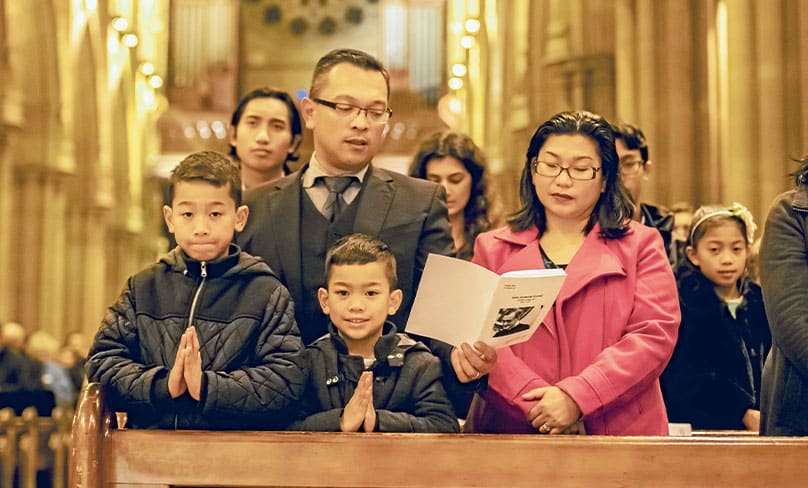 Families descended on St Mary’s Cathedral to fill it for the feast of St Josemaria Escriva, the founder of Opus Dei. Photo: Giovanni Portelli