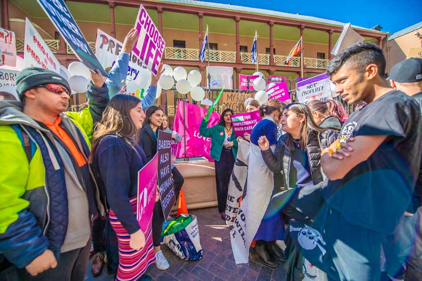 If this trend continues, “no religion” will officially overtake Christianity as the majority “faith” in the 2026 census. Protesters from either side of the abortion debate face off on Macquarie Street in front of NSW Parliament House on 5 August. PHOTO: Giovanni Portelli