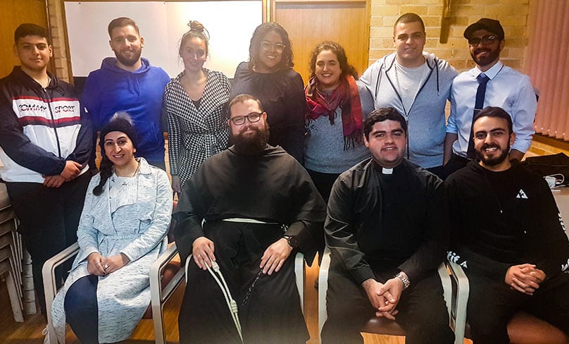 Brother Bernard Mary Fonkalsrud OFM Conv. with the youth at St Felix Bankstown on 21 August.