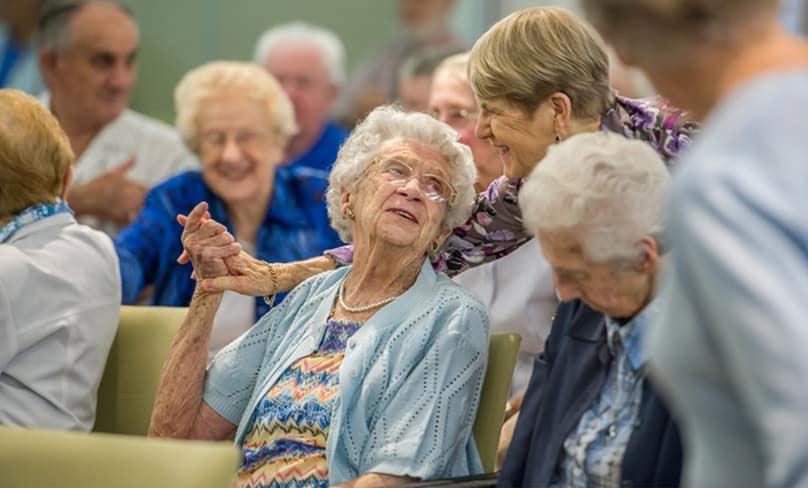 Residents at John Paul Village on Holy Thursday. Photo: Giovanni Portelli