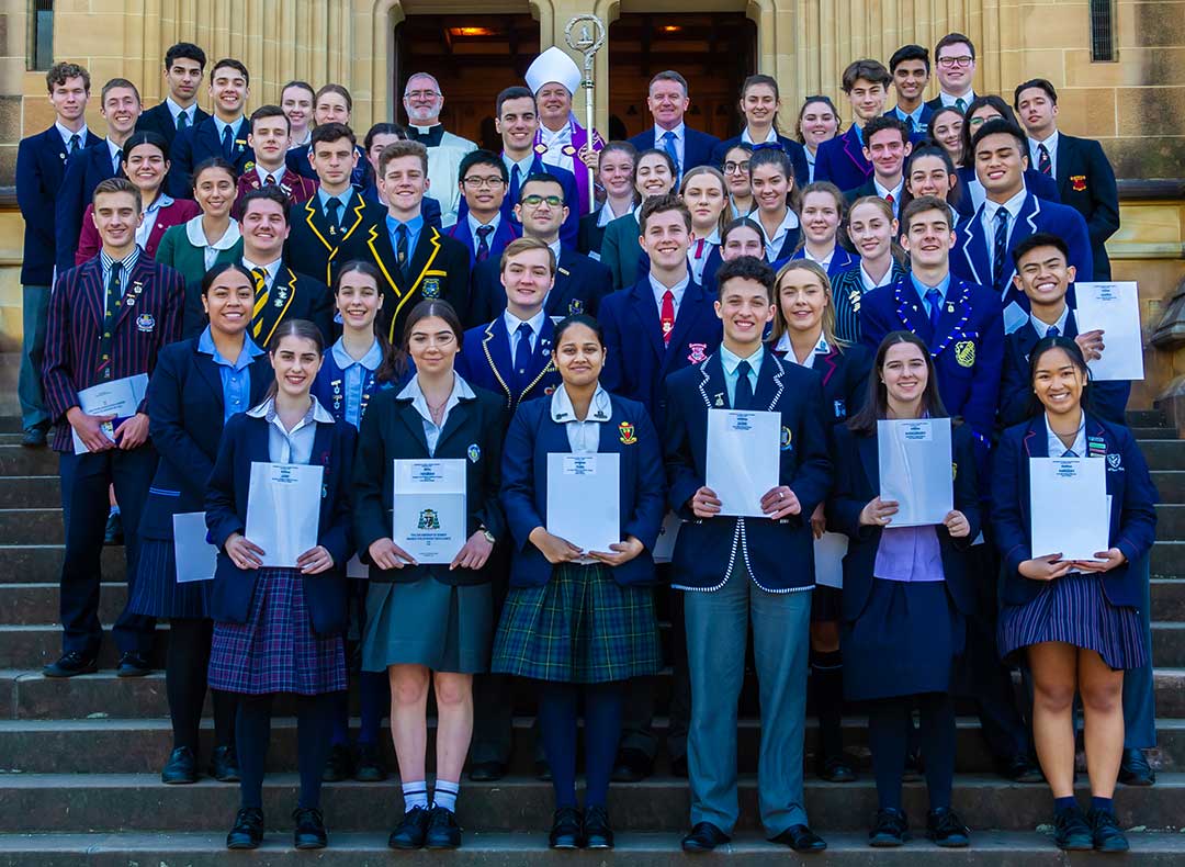 Students from Catholic schools across the Archdiocese of Sydney pose with Archbishop Anthony Fisher OP after receiving their 2019 Awards for Excellence. Photo: Giovanni Portelli