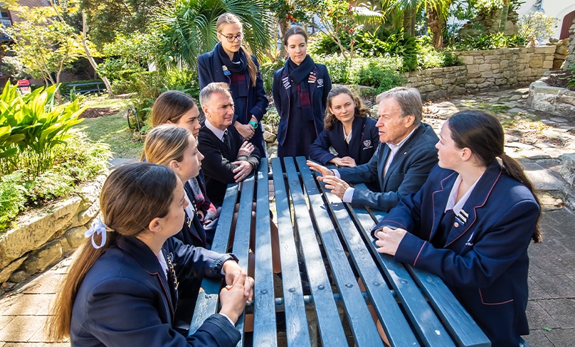 Leader of Information, Literacy and Innovation Michael Burden, left, with acclaimed writer/director Patrick Lindsay and students from St Clare's Waverley. Photo: Giovanni Portelli