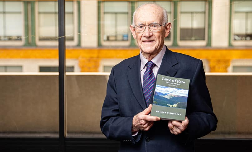 Paul Crittenden with a volume of his brother Maurice’s poetry. Photo: Alphonsus Fok