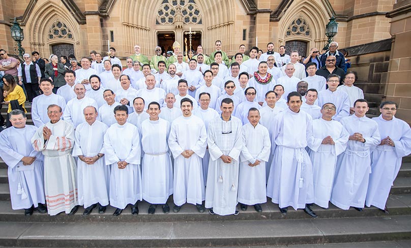 Archbishop Anthony Fisher OP with more than 50 newly installed acolytes at St Mary’s Cathedral. Photo: Giovanni Portelli