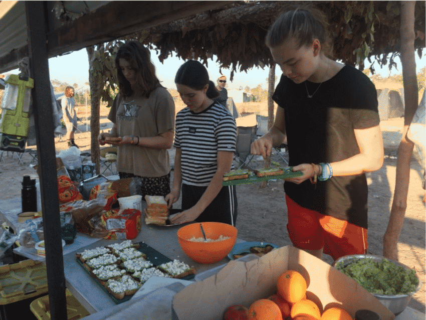 Students from St Clare's College Waverley preparing a meal during their Northern Territory immersion. Photo: Supplied