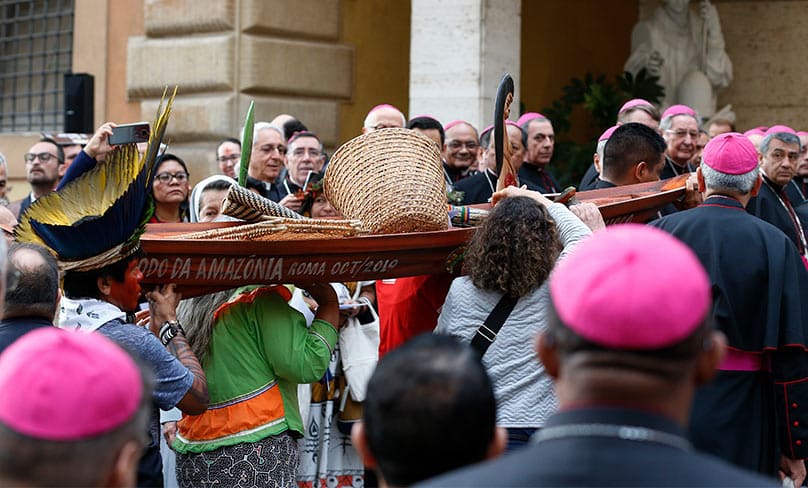 A boat is carried a procession at the start of the first session of the Synod of Bishops for the Amazon at the Vatican. Photo: CNS photo/Paul Haring