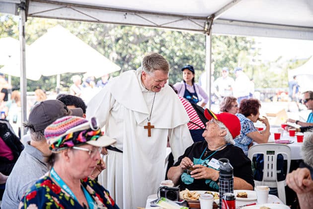 Archbishop Fisher chats with participants at Street Feast 2019. Photo: Alphonsus Fok
