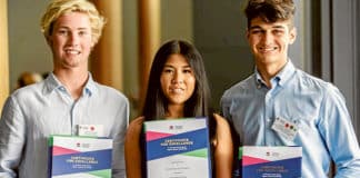 Seamus Connon, left, Christabel Chang and Robert Ciccarelli proudly display their First in HSC course certificates on Monday. Photo: Giovanni Portelli