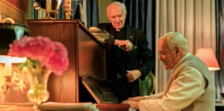 Pope Benedict XVI (Anthony Hopkins) sparks a moment of reflection for Cardinal Bergoglio (Jonathon Pryce) as he showcases his piano prowess. Photo: Peter Mountain, NETFLIX