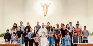 Fr Chris De Sousa CRS joins Moorebank parishioners who made a commitment to youth ministry.