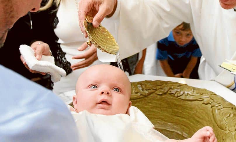 A baby is baptised. The issue of what has recently been described in a Vatican document as ‘baptised unbelievers’ has become a major issue for the Church - no less in Australia. Photo: CNS, Gregory Shemitz
