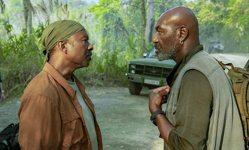 Johnny Nguyen, Clarke Peters and Delroy Lindo star in a scene from the movie "Da 5 Bloods." Photo: CNS photo/David Lee, Netflix