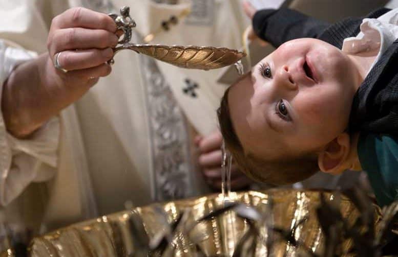 Well-meaning priests will often baptise children with very few questions and no follow-up in a vague hope that faith will magically stick to the child and family. PHOTO: CNS/Vatican Media