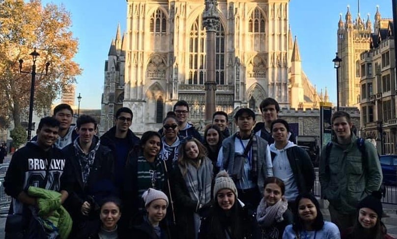 Students participating in the ACU School Leavers Program take a break in front of Wesminster Abbey in London. Photo: courtesy ethan westwood