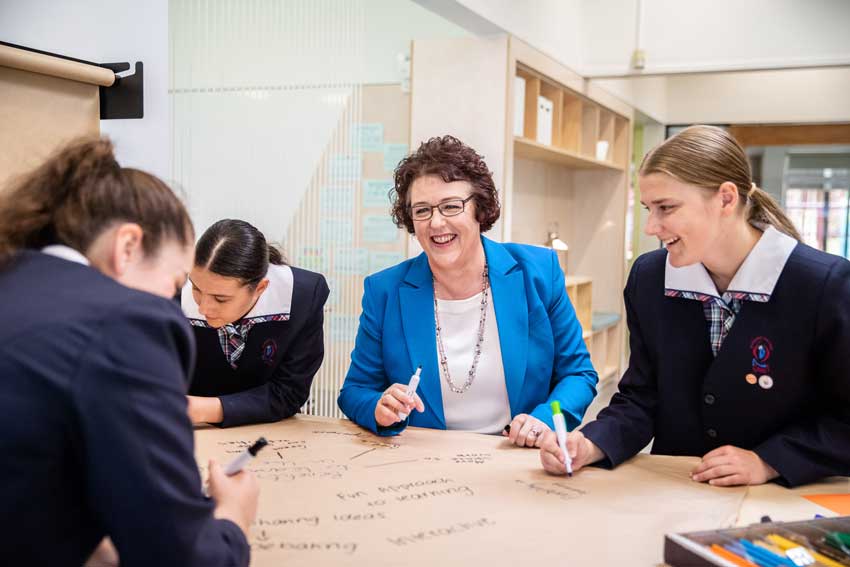 NCEC head Jacinta Collins, second from right, says in order to operate and teach according to our ethos and build a community of faith, we have to be able to serve the needs of Catholic families first. Photo: Supplied