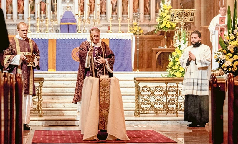 Archbishop Anthony Fisher OP blesses Sr Mary Paul’s coffin. Photo: Funeral Video Australia