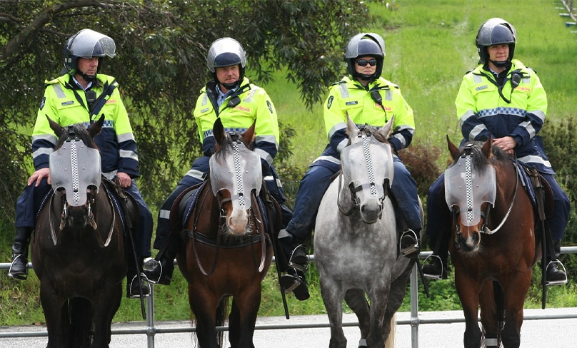 Mounted police officers on standby at a peaceful demonstration at Hazelwood Power Station, Victoria. Photo: Simpsons fan 66/Wikimedia Commons, CC BY-SA 3.0