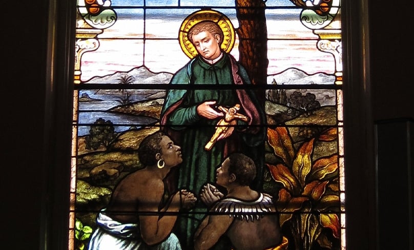 St. Peter Claver is depicted in a stained-glass windows teaching slaves in Cartagena, South America. Photo: Nheyob/Wikimedia Commons, CC BY-SA 3.0