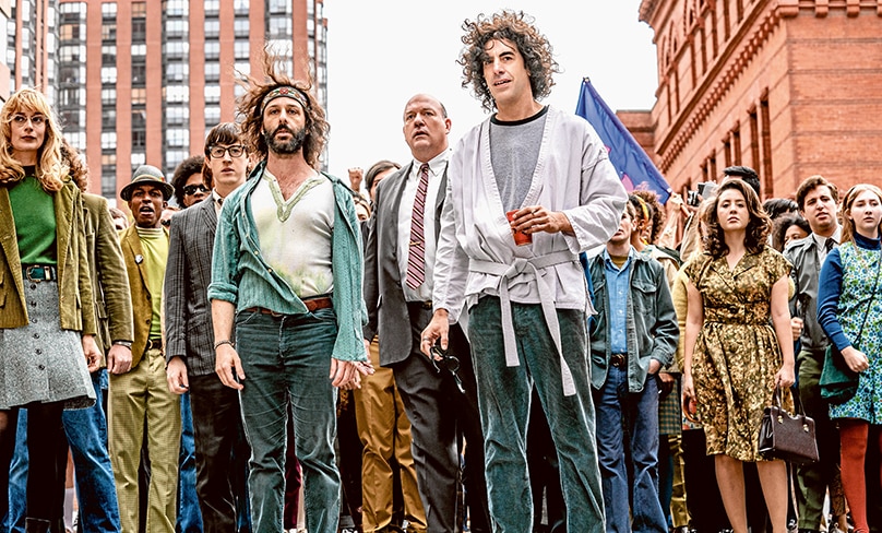 Convinced they understood everything: Caitlin Fitzgerald as Daphne O’Connor, Alan Metoskie as Allen Ginsburg, Alex Sharp as Rennie Davis, Jeremy Strong as Jerry Rubin, John Carroll Lynch as David Dellinger, Sasha Baron Cohen as Abbey Hoffman, Noah Robbins as Lee Weiner. Photo: Nico Tavernise/Netflix