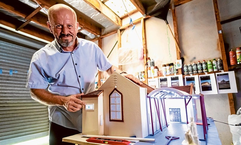 Sub-deacon Naser Mansor displays his model of Our Lady of Mercy Syriac Church in Concord in his Fairfield workshop. Photo: Giovanni Portelli