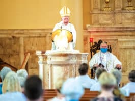 Bishop Terry Brady preaches at the 100th anniversary Mass at St Brigid’s in Coogee. Photo: Giovanni Portelli