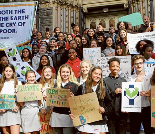 Students from Catholic schools in the Washington Archdiocese stand outside St Patrick’s Church in Washington in 2019 prior to the climate change rally at the US Capitol. Photo: CNS/Carol Zimmermann