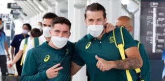 Masked and ready to go … Olyroos teammates Cameron Devlin and Jordan Holmes in Tokyo. Photo: Supplied