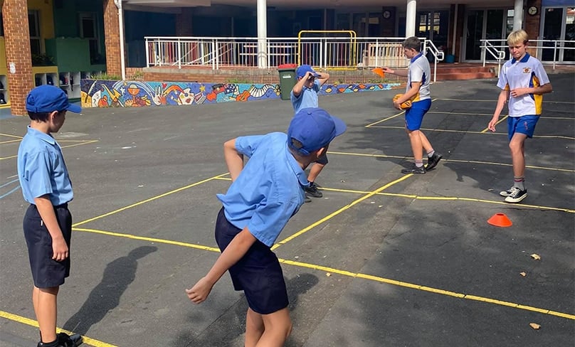 Students from St Francis De Sales primary school playing with fellow students from De La Salle College, Caringbah. Photo- Sydney Catholic Schools
