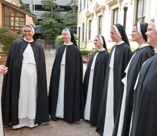 Mariam Assaf O.P., the former parishioner of Holy Name of Mary Parish, Hunters Hill, with five others as Dominican Sisters of St Cecilia, who made their profession in Nashville, Tennessee. Photo: Sister Mary Justin Haltom, O.P.
