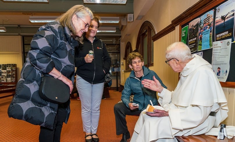 Following the Mass celebrating his 60th anniversary of ordination to the priesthood last year at St Benedict’s Church in Broadway, Fr John Neill OP caught up with numerous friends who turned out for the milestone occasion. Photo: Patrick J Lee